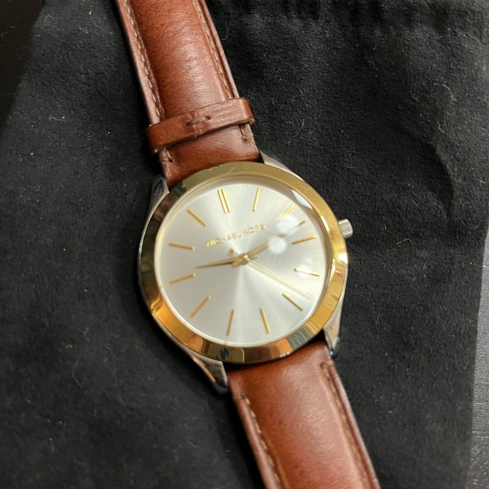 Women’s mixed metal leather watch